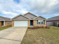 Building Photo - 4 bedroom 2 bath brick home available for ...