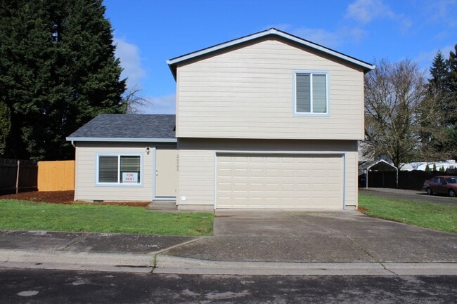 Building Photo - 4 BR, 2 1/2 BA home with fenced yard.