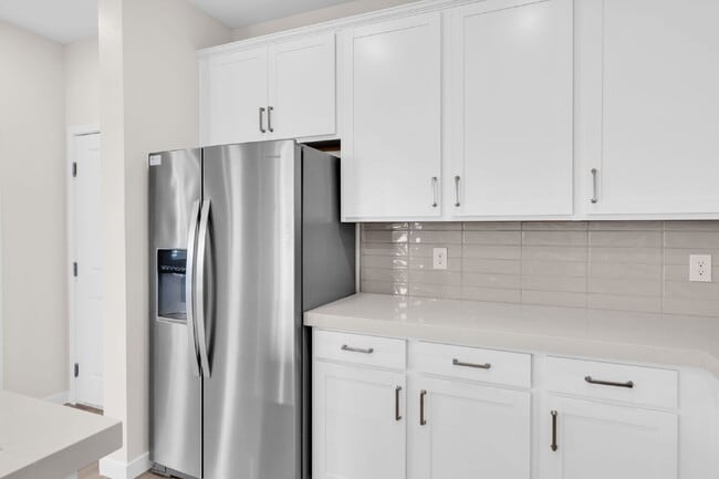 Building Photo - BRAND NEW - NEVER LIVED IN 3 BR/2.5 BA Townhouse across the street from Henderson Hospital and Me...