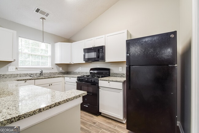 Building Photo - 9407 Rollinghills Dr