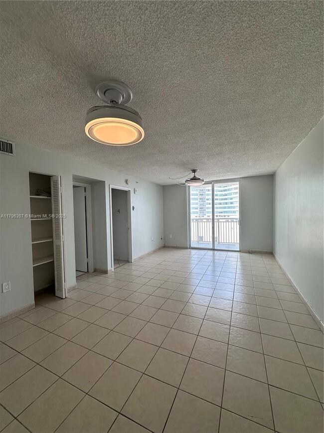 Building Photo - 6969 Collins Ave