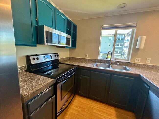 Building Photo - 1028 Billy Frank Jr St #301