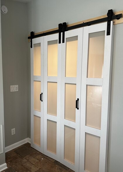 New Farmhouse style accordion doors provide privacy for bonus space - 5 Greenwich Dr