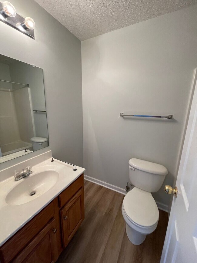 Building Photo - Spacious End Unit Towhouse in Desirable Liberty Square!