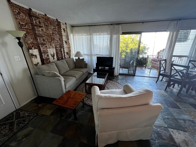 Building Photo - Furnished 2 bedroom 2 bath condo with assigned parking stalls