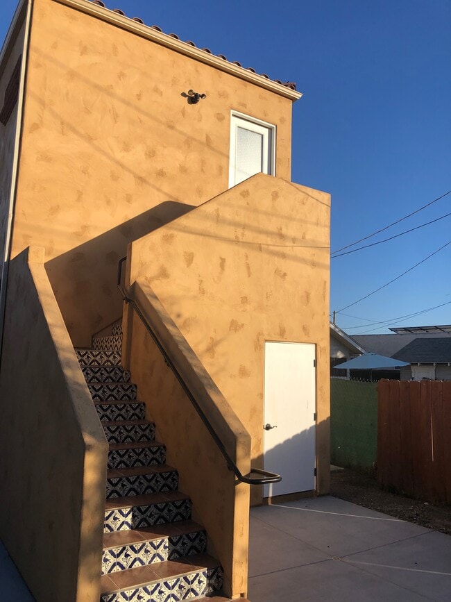 Rear entrance and door to first-floor storage. - 4470 Swift Ave
