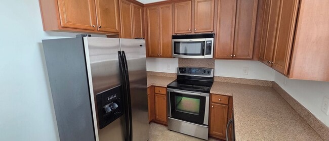 Building Photo - This phenomenal townhome is truly move-in ready!