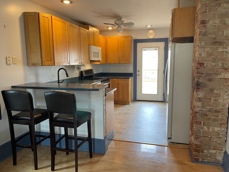 deck door off kitchen. raised bar (chairs not guaranteed). - 15 Congdon Ave