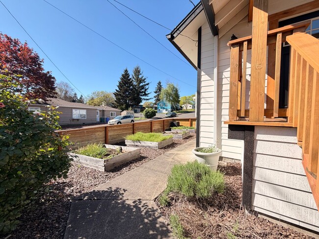 Building Photo - Lovingly Updated Home with Separate Garage, Outdoor Cat Enclosure, Finished Basement, Large Yard,...