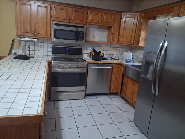 Building Photo - 7885 Van Buren St NE