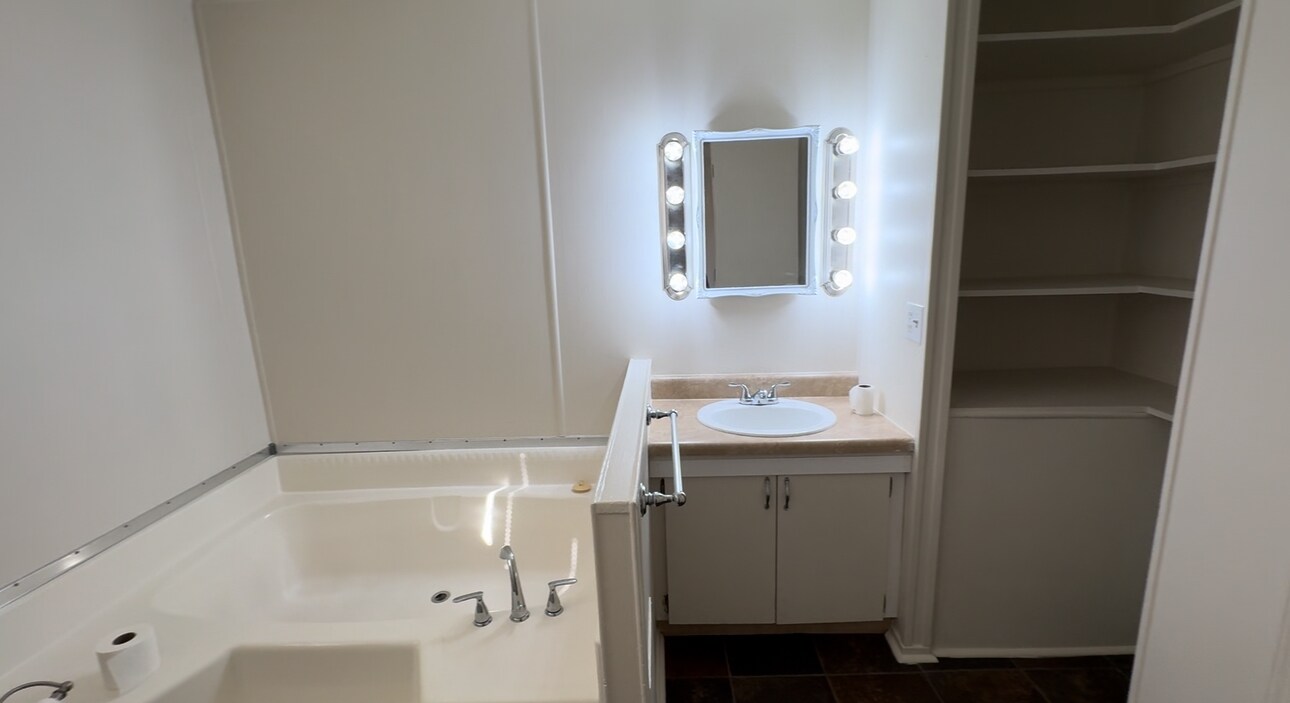 Master with a lot of shelving and a closet. - 1768 Pitch Landing Rd