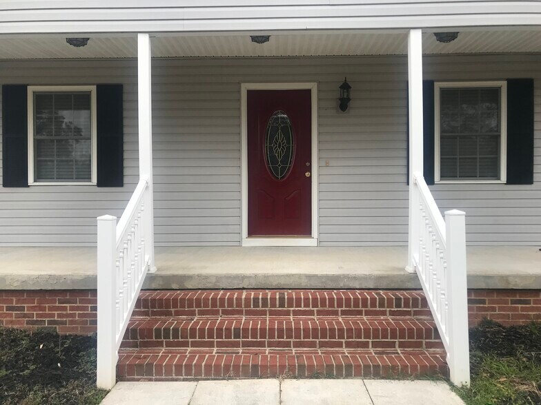 Cranberry Front Door, Gray, White with Black Shutters Brick Foundation - 1619 Cedar Rock Church Rd
