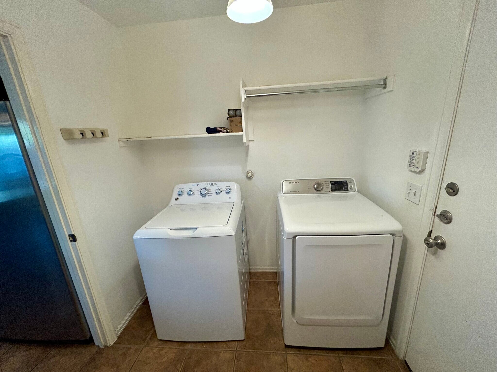 Laundry room off kitchen; W/D installed in 2022 - 1305 Sunflower Ln