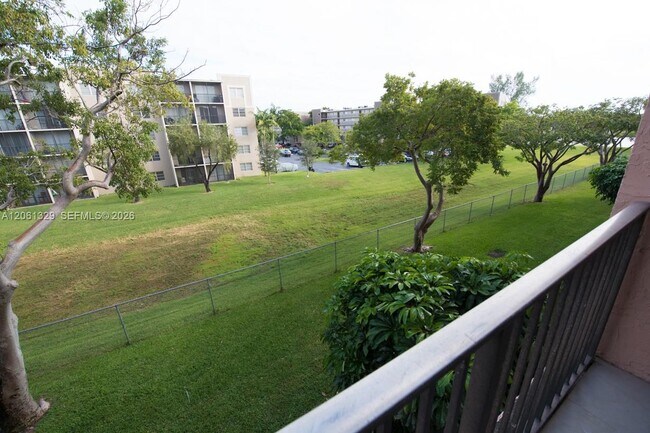 Building Photo - 8550 N Sherman Cir