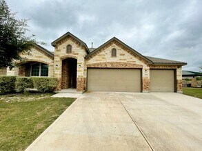 Building Photo - Move-In Ready! Stunning 1.5-Story Home wit...