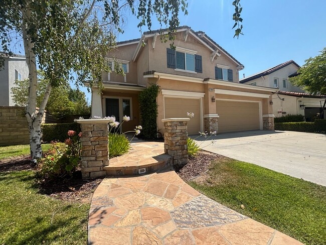 Building Photo - Spacious 4-Bedroom Home with Community Ame...