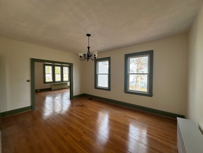 Building Photo - House in Bedford with Lot of Outdoor Space.