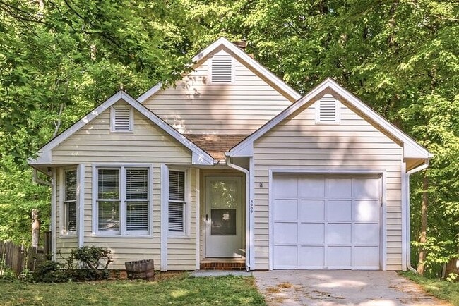 Building Photo - NW - Updated Home with Granite Counter-tops, Fire Place, Deck, Storage Building, Garage!