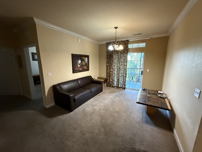 Building Photo - Spacious Furnished 3-Bedroom Condo Oasis w...