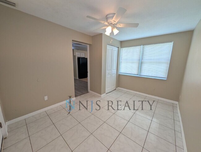 Building Photo - Newly renovated 3/1/1 NEW flooring, NEW paint, updated kitchen & bath, fenced yard.. a MUST SEE!!