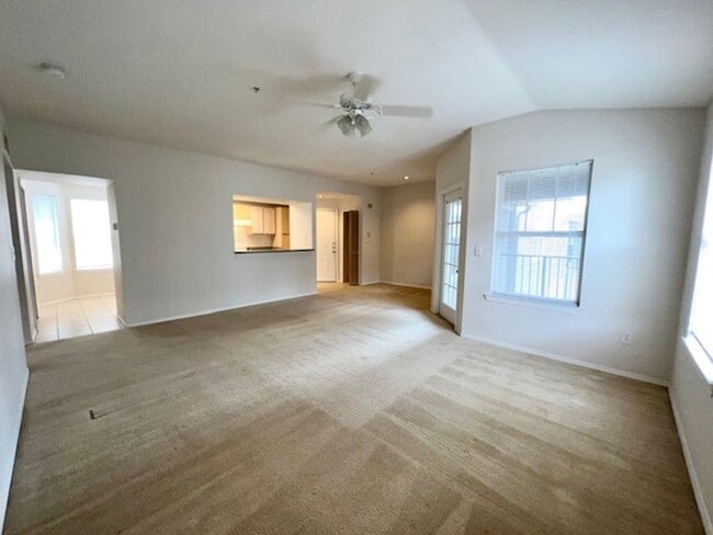 Building Photo - Move in NOW- Spacious 2 bedroom 1 bath condo on 3rd floor in gated community! Water included with...