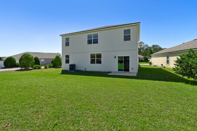 Building Photo - Spacious 5-Bedroom Home  – Prime Amelia Concourse Location!