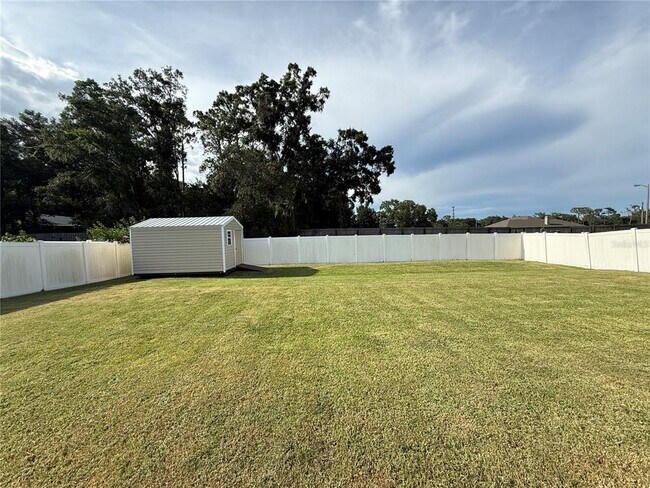 Building Photo - 6937 Minaxi Dr