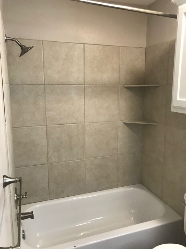 Building Photo - 2BD/2.5BA Condo | TAMU Bus Route | Private Yard | Pet Friendly