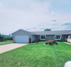 Building Photo - Townhouse (2 bdrm with 2.5 car garage, yard, private basmnt)