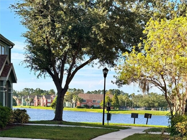 Building Photo - 9842 Lake Chase Island Way
