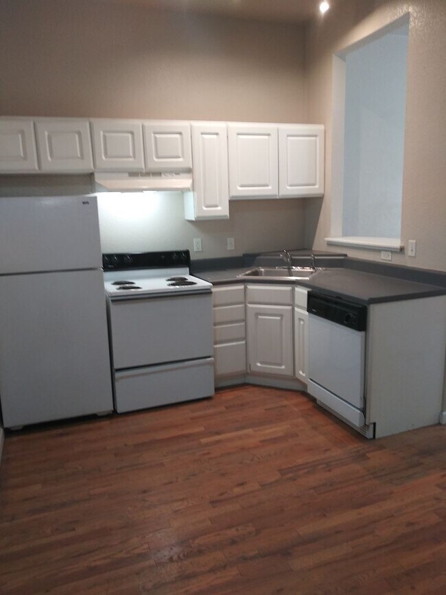 Building Photo - PRICED REDUCED!! Large windows and exposed...