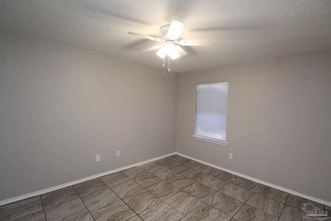 Building Photo - 6810 Tiki Ln