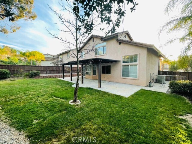 Building Photo - 42020 Dahlia Way