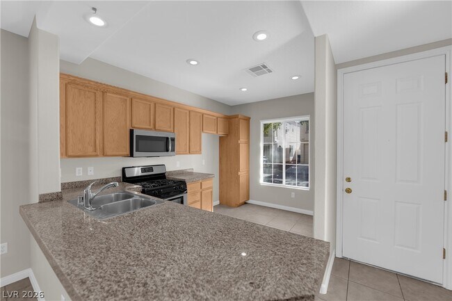 Building Photo - 8273 Golden Flowers St
