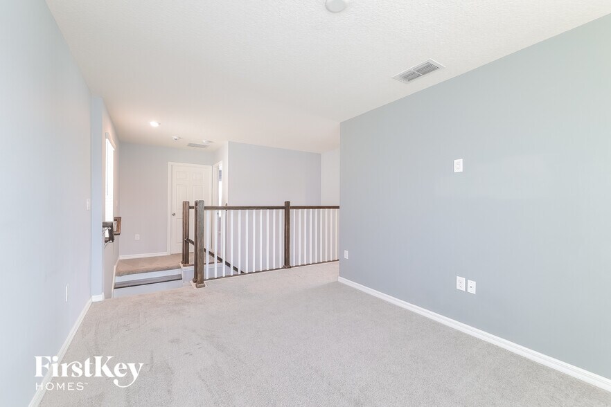 Building Photo - 2412 Riverbank Cv
