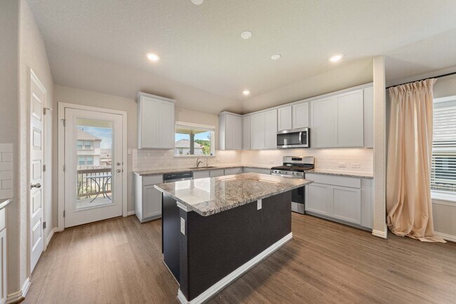 Building Photo - Stylish 3-Bed Home with Pool Access, Island Kitchen & Fenced Yard in New Braunfels