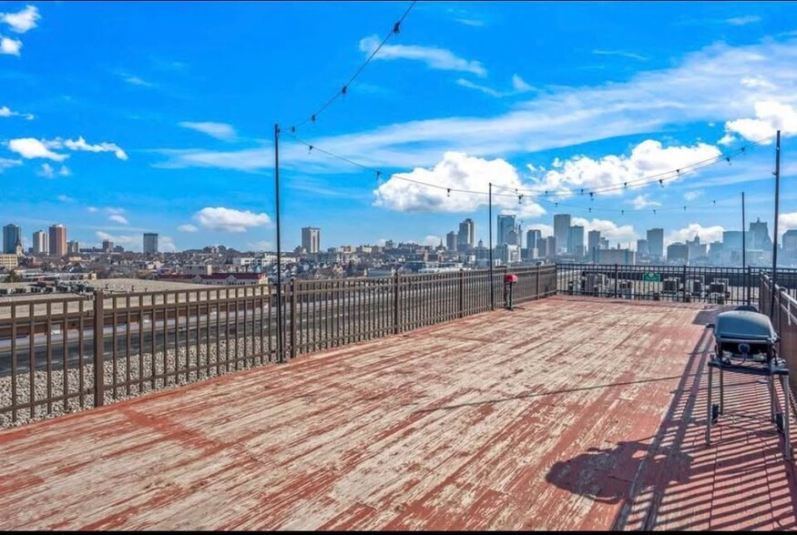 Rooftop open to all tenants. - 234 E Reservoir Ave