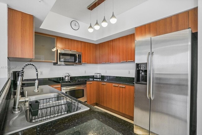 Building Photo - 16699 Collins Ave