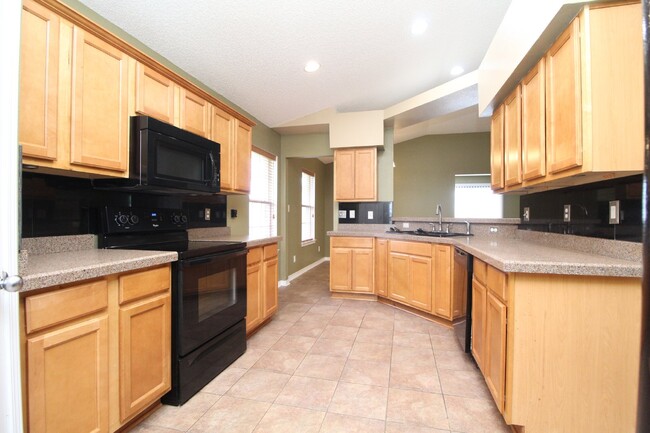 Building Photo - Executive 3-Bedroom Brick Home with Florid...