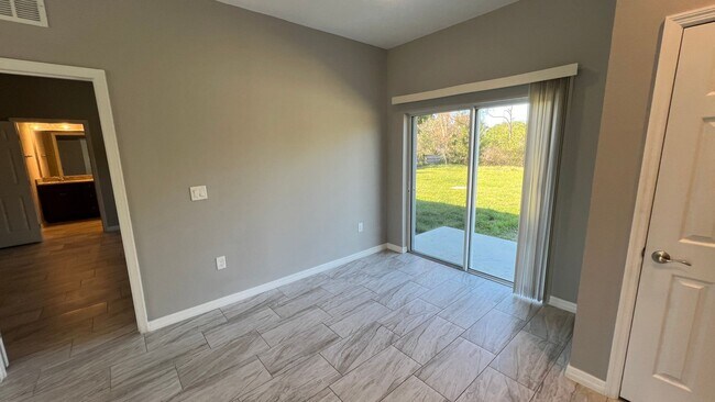 Building Photo - Beautiful 3 Bedroom Palm Bay Home with Upgrades & No Water Bill!