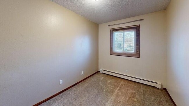 Building Photo - 202 4th Ave SW
