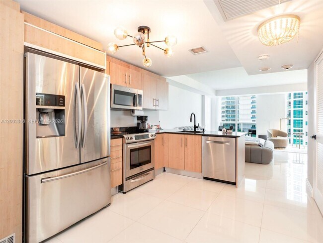 Building Photo - 10275 Collins Ave