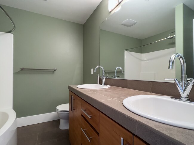 Building Photo - Enjoy this 3 Bedroom 2.5 Bathroom End Townhome ~ 2 Car Garage + Washer & Dryer! Great Cedar Mill ...