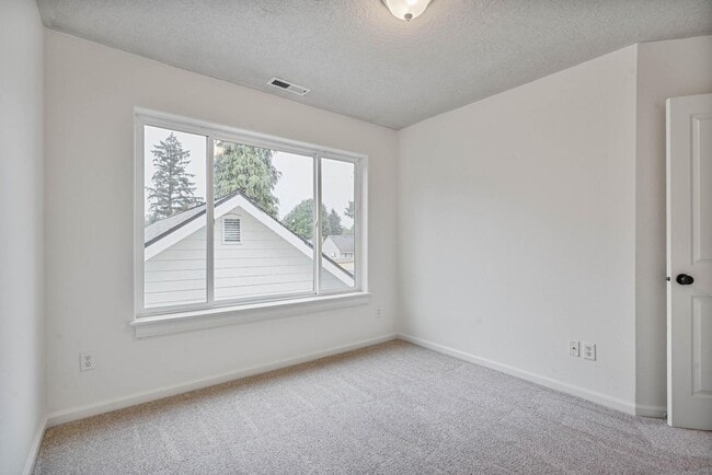 Building Photo - 10106 N Calhoun Ave