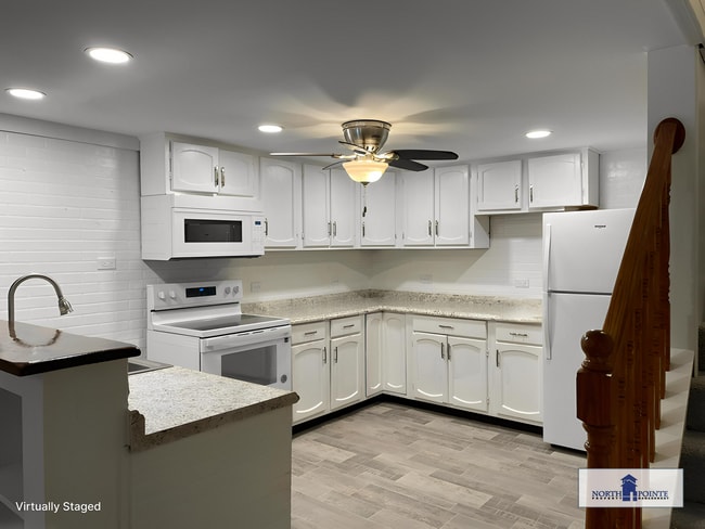 Building Photo - Newly Updated 4 Bedroom 1 Bathroom Townhom...