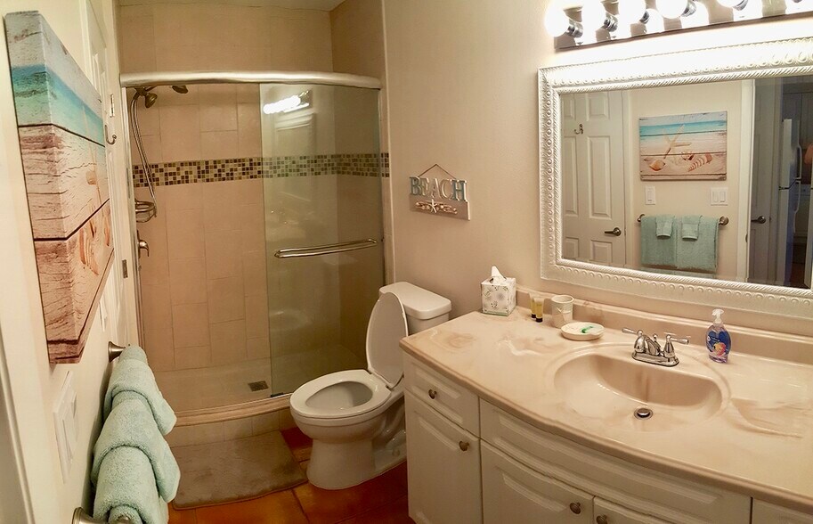 Full sized bathroom/shower. - 7006 Midnight Pass Rd