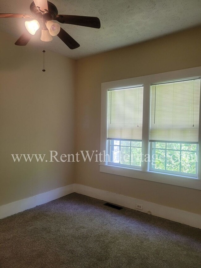 Building Photo - ENJOY THE PRESTIGE OF THIS CHARMING HOME I...