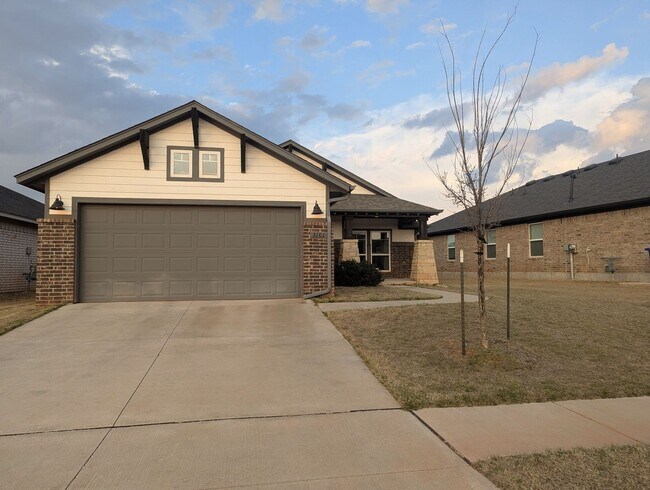 Building Photo - Modern Norman Home | Storm Shelter, Covered Patio, Community Pond & Park!