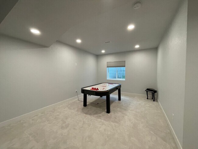 Building Photo - Live Lavishly in Harmony Ridge- Fully Furnished 5-Bedroom Dream Home with Backyard Oasis & Speake...