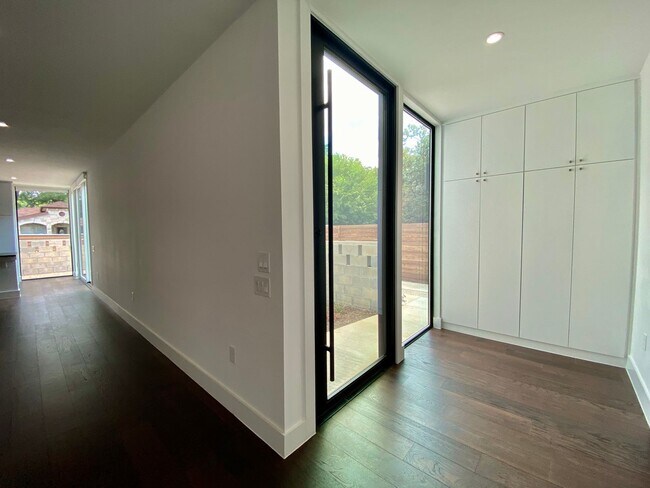 Building Photo - Modern Luxury Near the Lake – Sleek Design...